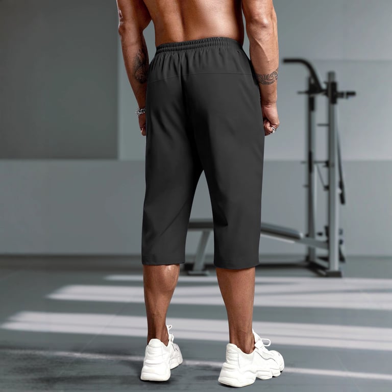 Close-up of zippered side pocket on men's capri running pants
