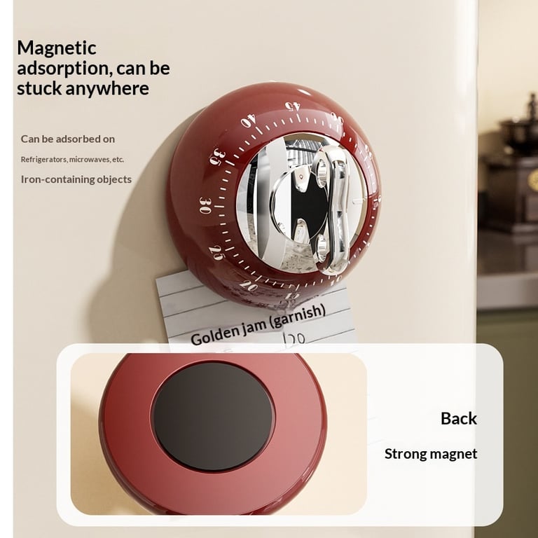 Mechanical kitchen timer showing wind-up key and 60-minute dial