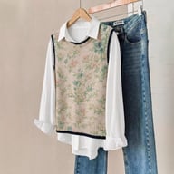 Women's floral knitted vest styled with white shirt and jeans