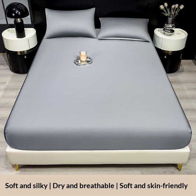 Light green ice silk fitted sheet with matching pillowcases displayed