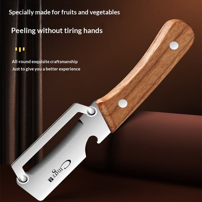Stainless steel peeler slicing fresh cucumber into thin ribbons on wooden board