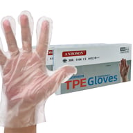 Transparent nitrile glove stretched on hand showing thickness and durability