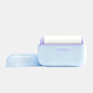 Reusable lint roller removing dog hair from furniture upholstery