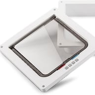 Weatherproof brush strip seals on XL pet door frame edges