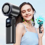 Woman using portable cooling ice fan for outdoor summer relief