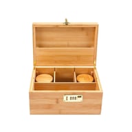 Compact jewelry storage box on bedroom dresser with closed magnetic clasp