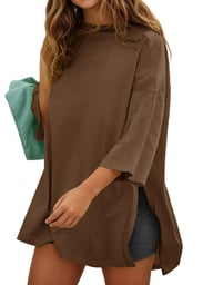 Brown women's oversized t-shirt with side slits on model