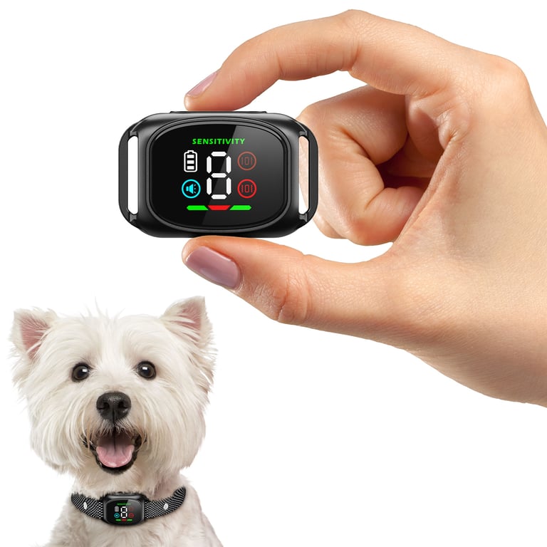 Black smart anti-bark module held in hand showing durability and compact design