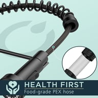 Close-up of food-grade PEX hose and spring mechanism on black tap