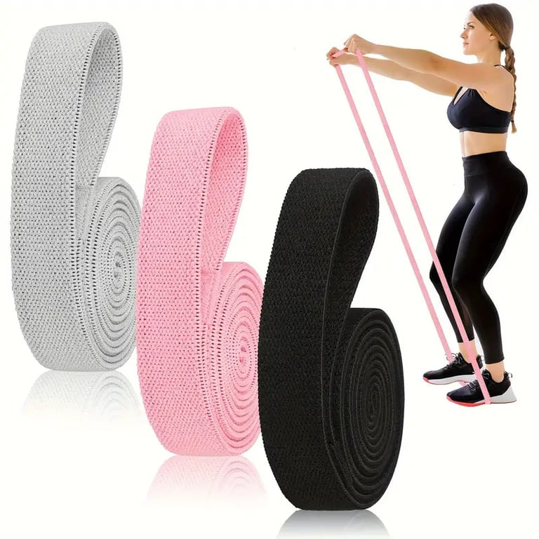 Woman using waist-slimming resistance band for core strengthening exercises