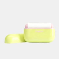 Portable pet hair remover with sealed lid, palm-sized design