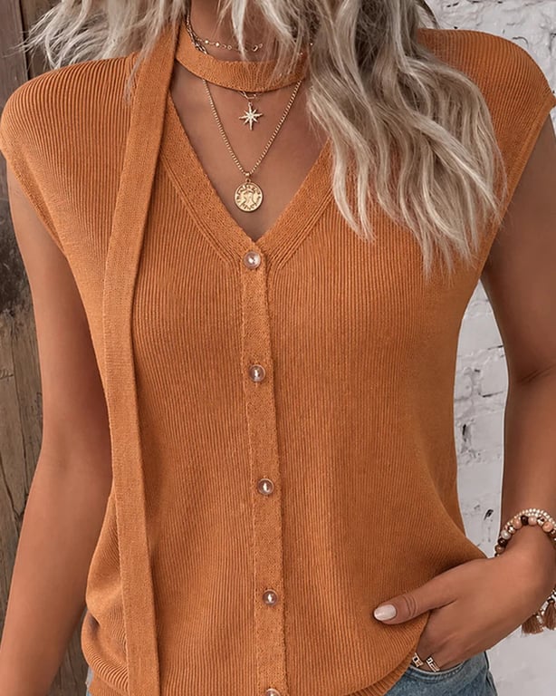 Styled flat lay showing V-neck cardigan with multiple outfit combinations