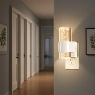 Warm ambient glow from corridor night light illuminating hallway safely