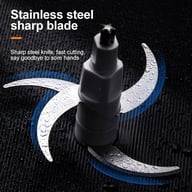 Close-up of sharp multi-blade system in electric meat grinder