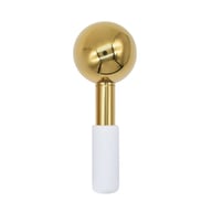 Close-up of gold stainless steel ice facial massage roller head