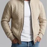 Beige men's jacquard stand-neck bomber jacket with textured pattern, worn casually