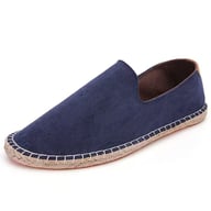 Blue canvas men's slip-on loafer shoe on white background
