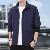 Man wearing black stand-up collar jacket showing interior details