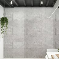 Modern living room wall featuring waterproof marble tile stickers, easy to clean