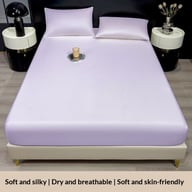 Lavender ice silk fitted sheet and matching pillowcases on bed