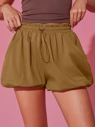 Close-up of brown bubble shorts elastic waistband with drawstring detail