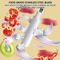 Food-grade stainless steel six-blade grinder head in action grinding meat