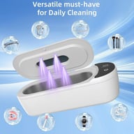 Open UV sanitizer showing purple light, cleaning glasses, jewelry, brushes