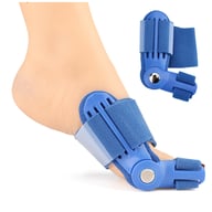 Blue bunion corrector worn on foot showing comfortable fit and design