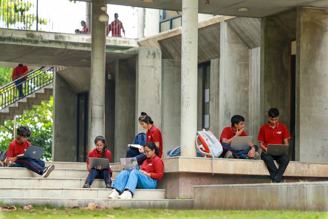 Students studying on the amphitheatre steps