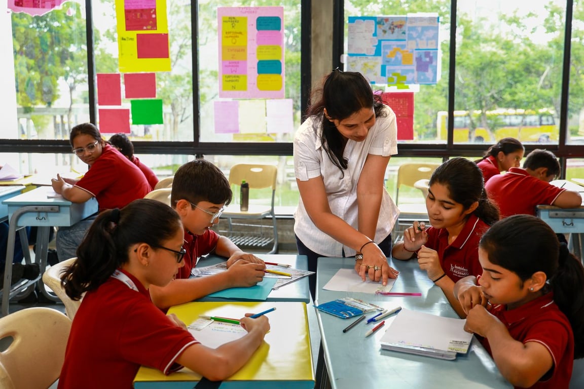 Teacher guiding students in class