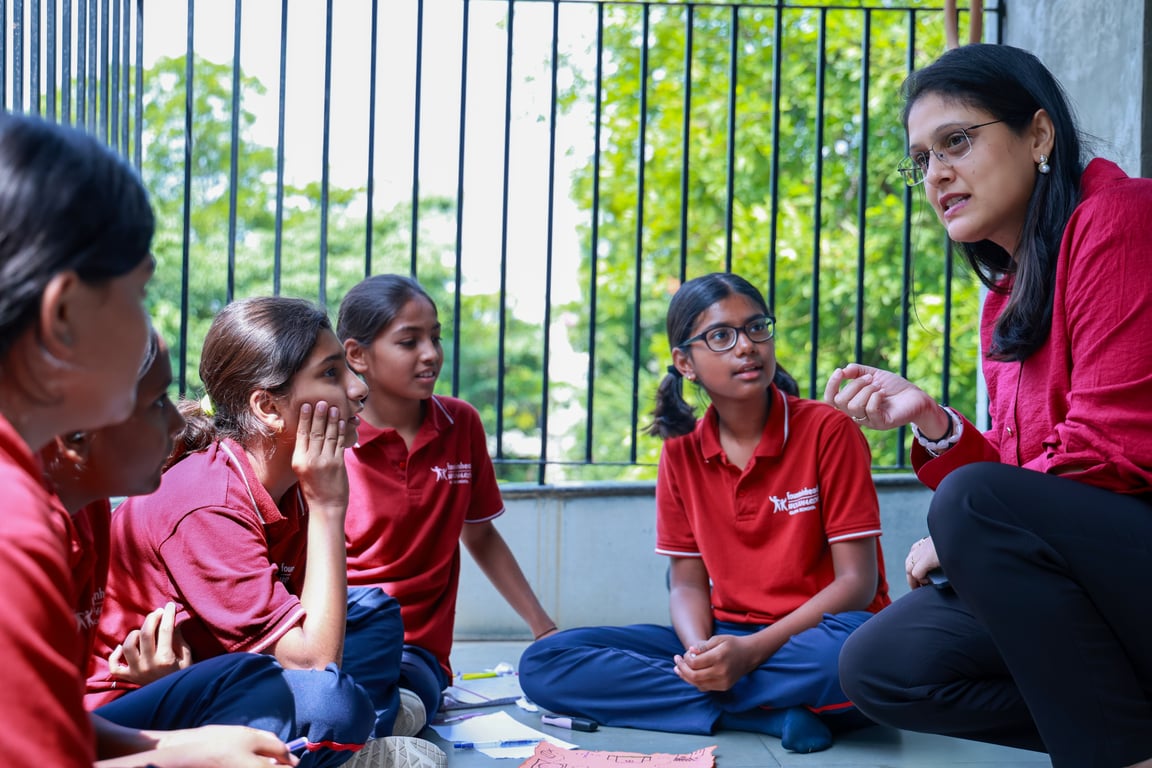 Counsellor engaging with FWGS students