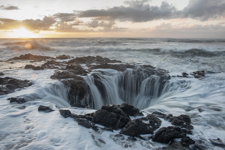 Thor’s Well On The Oregon Coast appears to be draining The Pacific Ocean.|Carefully arranged bones in the paris Catacombs.|Fly Geyser in the Black Rock Desert