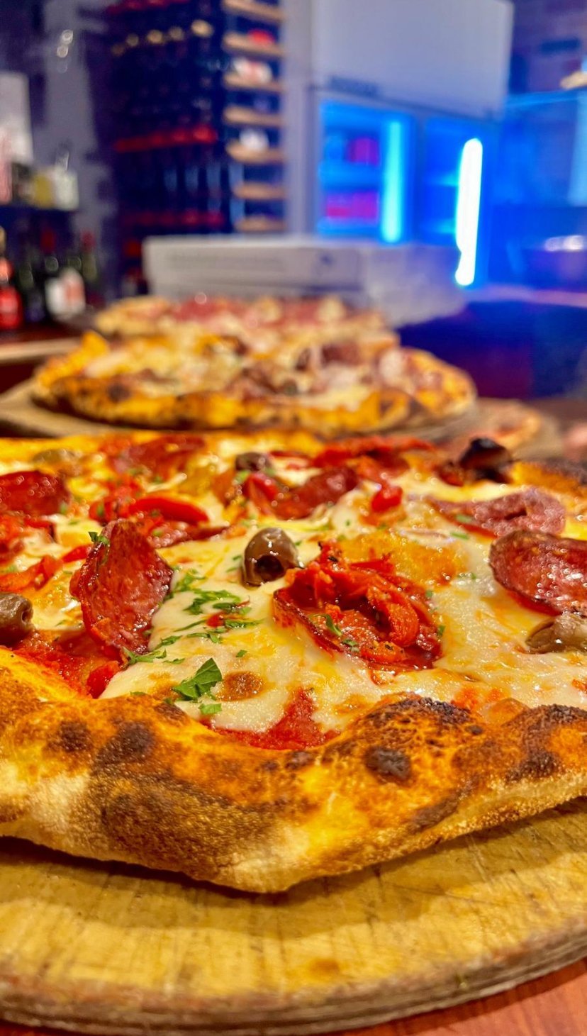 A salami pizza fresh from the oven