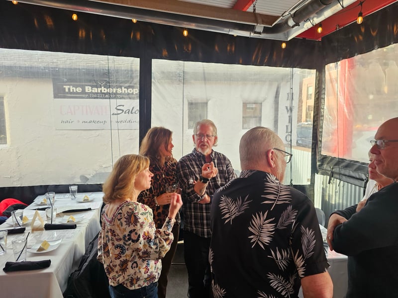 Couples mingling before dinner at the DougCo Social Couples Dinner