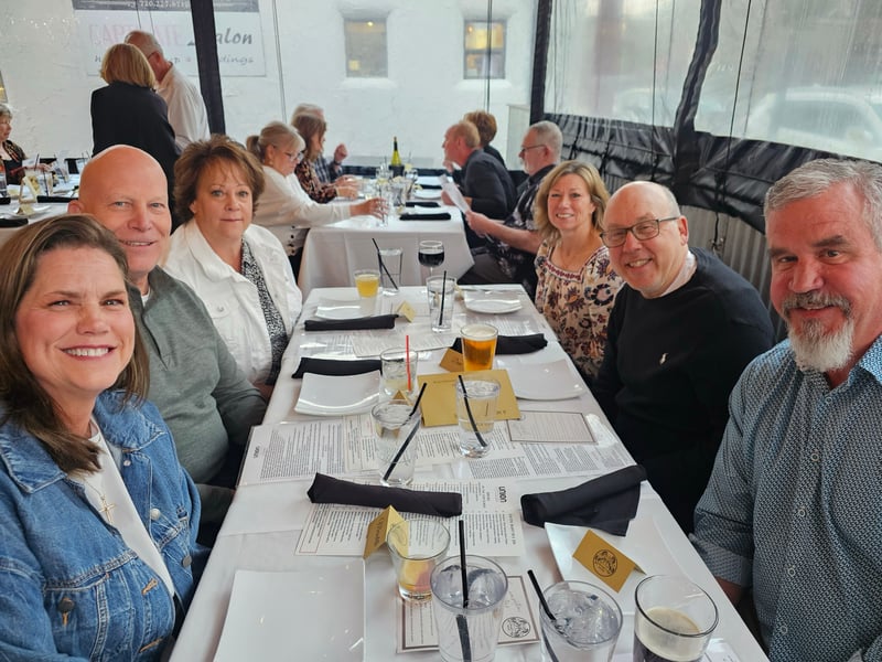 Couples seated together at the DougCo Social Couples Dinner