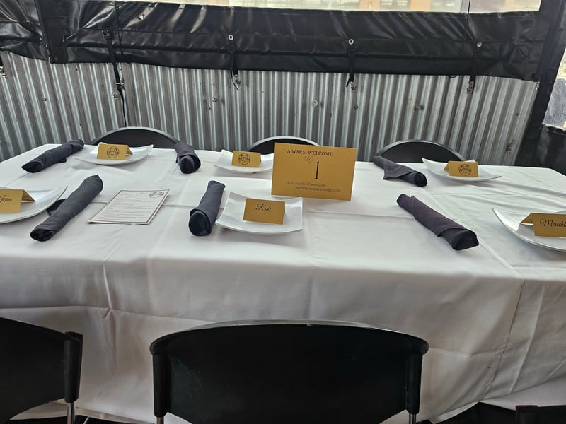 Handwritten name cards at the Couples Dinner table — A Warm Welcome to Table 1