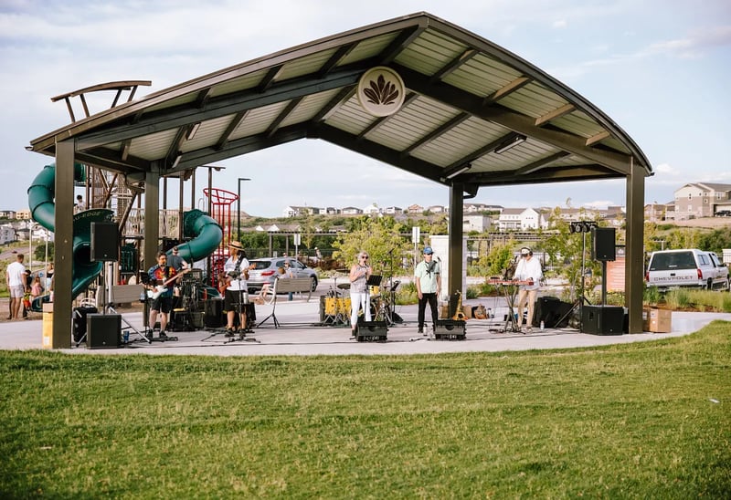A live band performs at The Green amphitheater at The Canyons in Castle Pines, Colorado