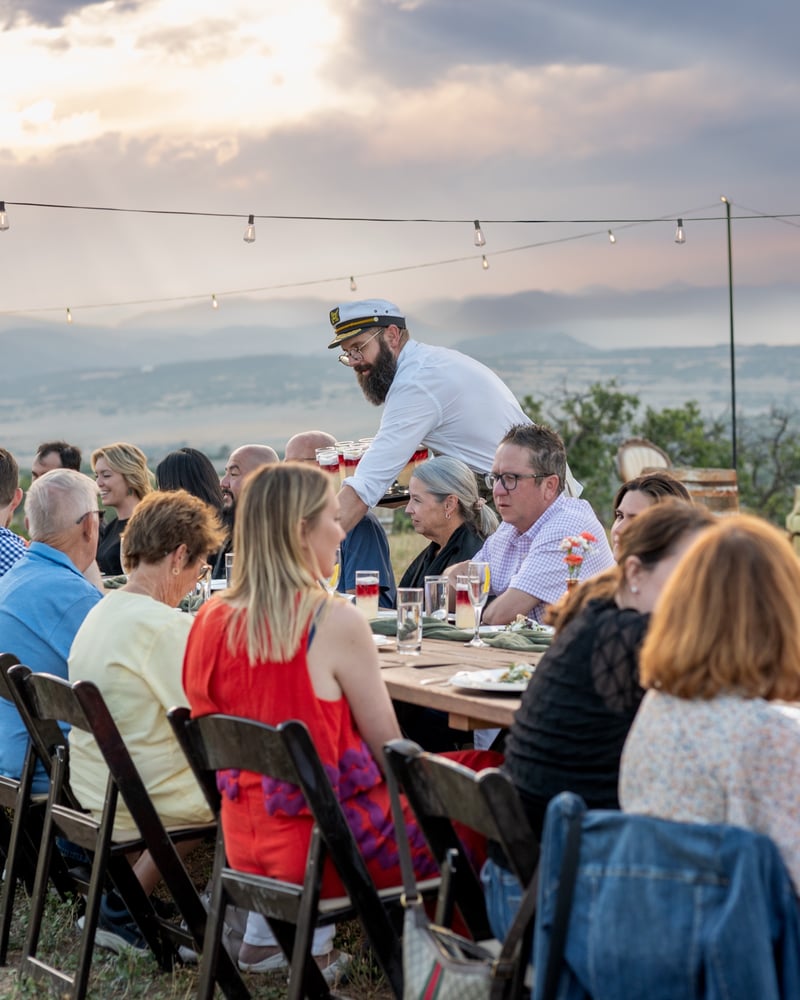 Serving drinks with Front Range views at the Sunset Supper Club at KB Ranch