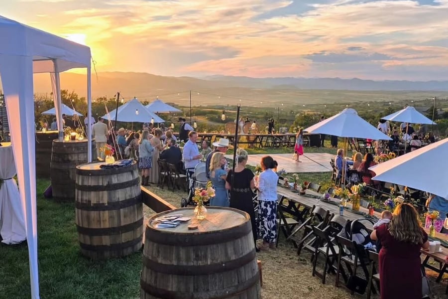 Outdoor farm-to-table dinner table set for a DougCo Social supper club