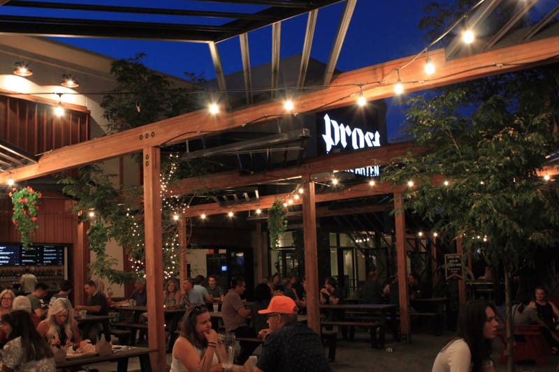 Prost Brewing Company Highlands Ranch biergarten patio at night