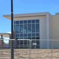 The glass entrance side of the AdventHealth Crystal Valley Health Park building