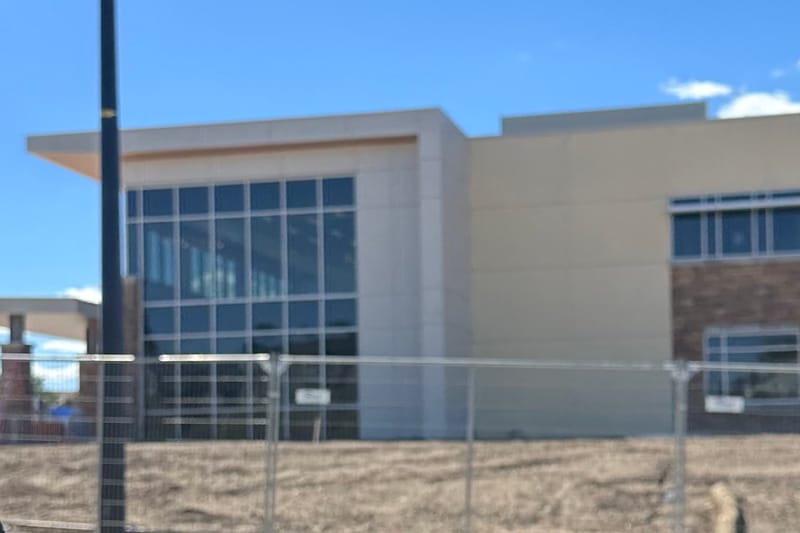 The glass entrance side of the AdventHealth Crystal Valley Health Park building