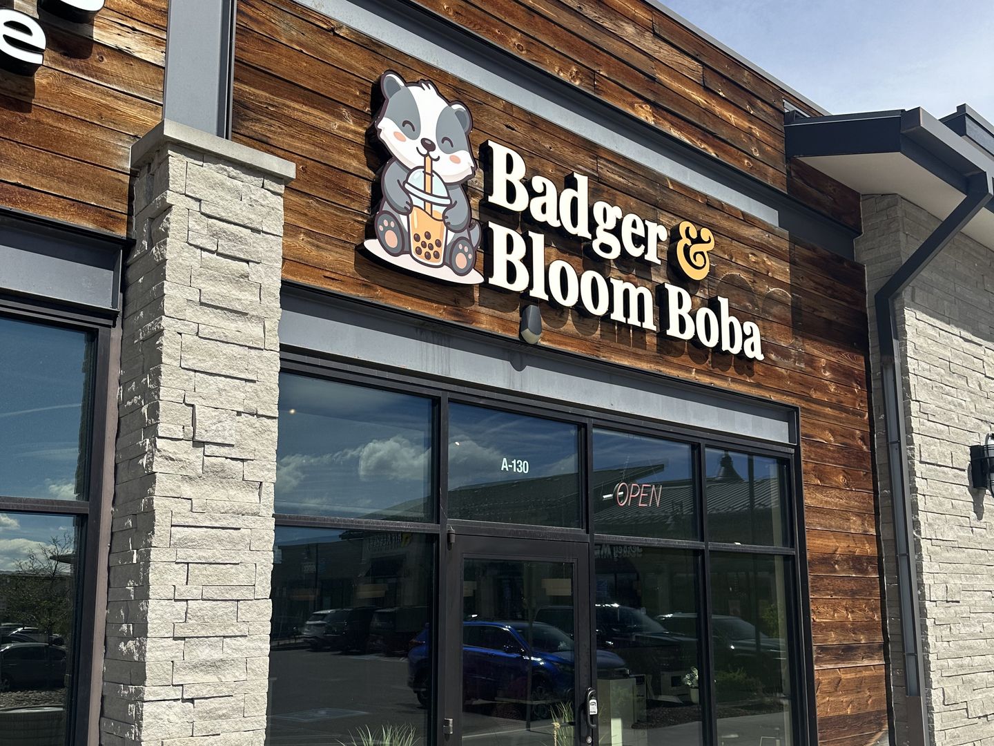 Badger & Bloom Boba storefront at the Outlets at Castle Rock, Unit A-130