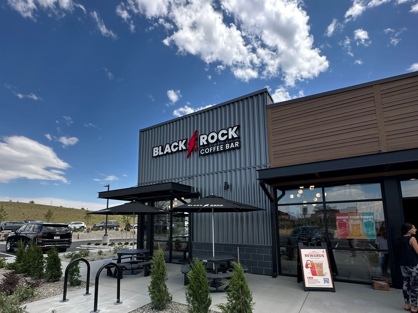 Black Rock Coffee Bar entrance and patio at 6940 Stroh Rd in Parker, the new Parker Road and Stroh Road location