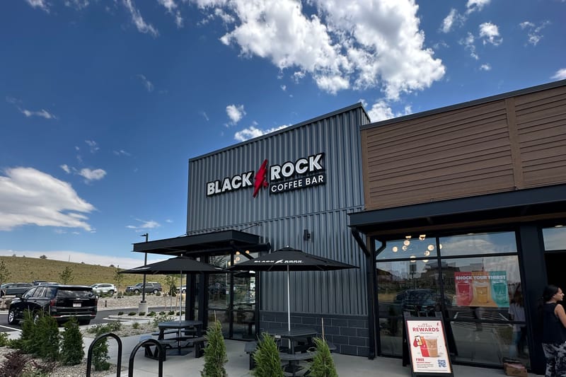Black Rock Coffee Bar entrance and patio at 6940 Stroh Rd in Parker, the new Parker Road and Stroh Road location