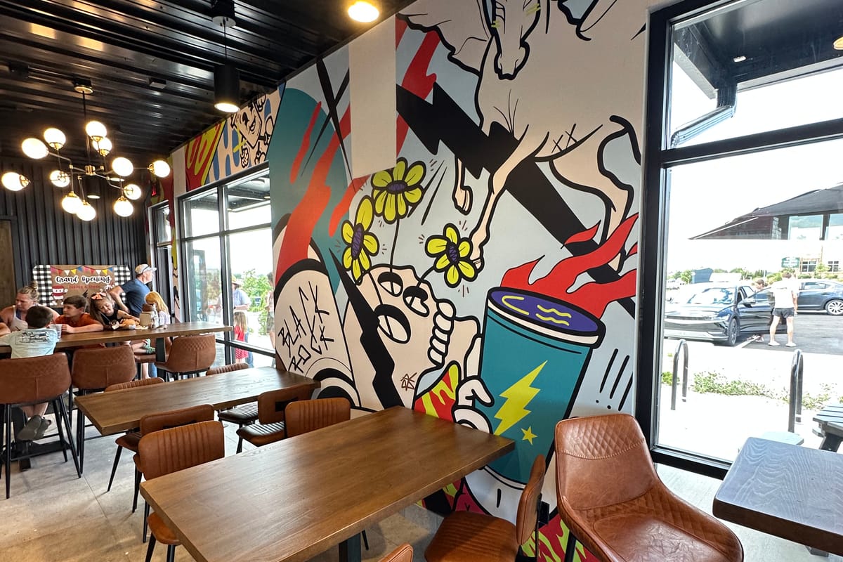 Black Rock mural with leather bar stools at the new Parker Black Rock Coffee on Stroh Road
