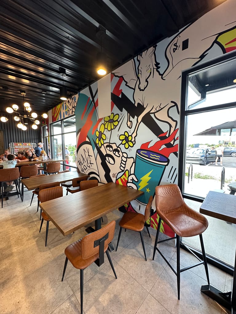 Black Rock mural with leather bar stools at the new Parker Black Rock Coffee on Stroh Road