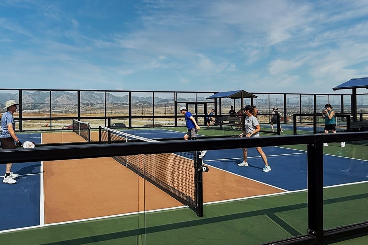 Pickleball players at Burns Regional Park in Sterling Ranch