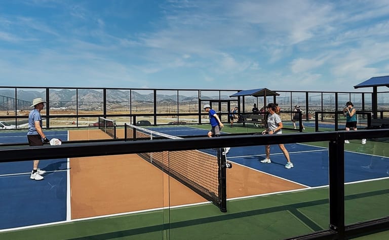 Pickleball players at Burns Regional Park in Sterling Ranch