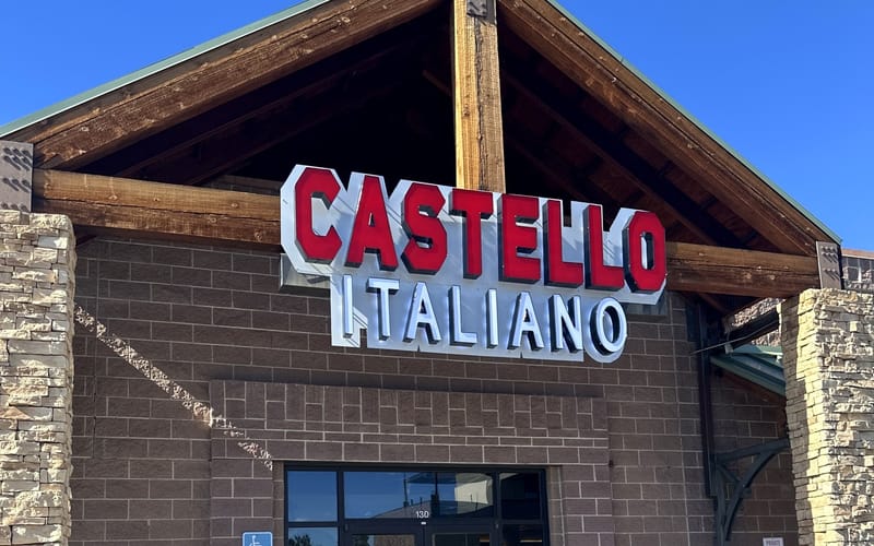 The Castello Italiano sign above the entrance at 361 Village Square Ln in Castle Pines